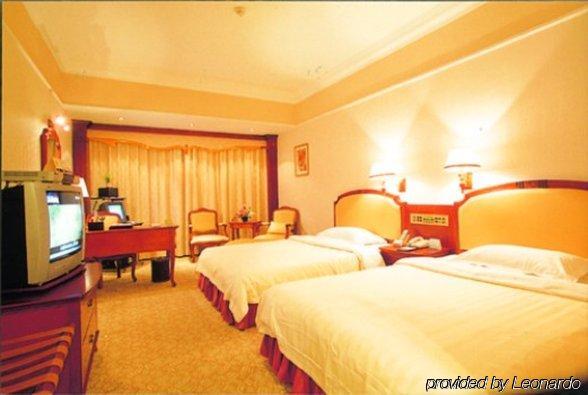 Phoenix Hotel Nanning Quarto foto